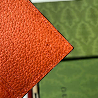 CARD HOLDER 12 IN ORANGE EMBOSSED CALFSKIN