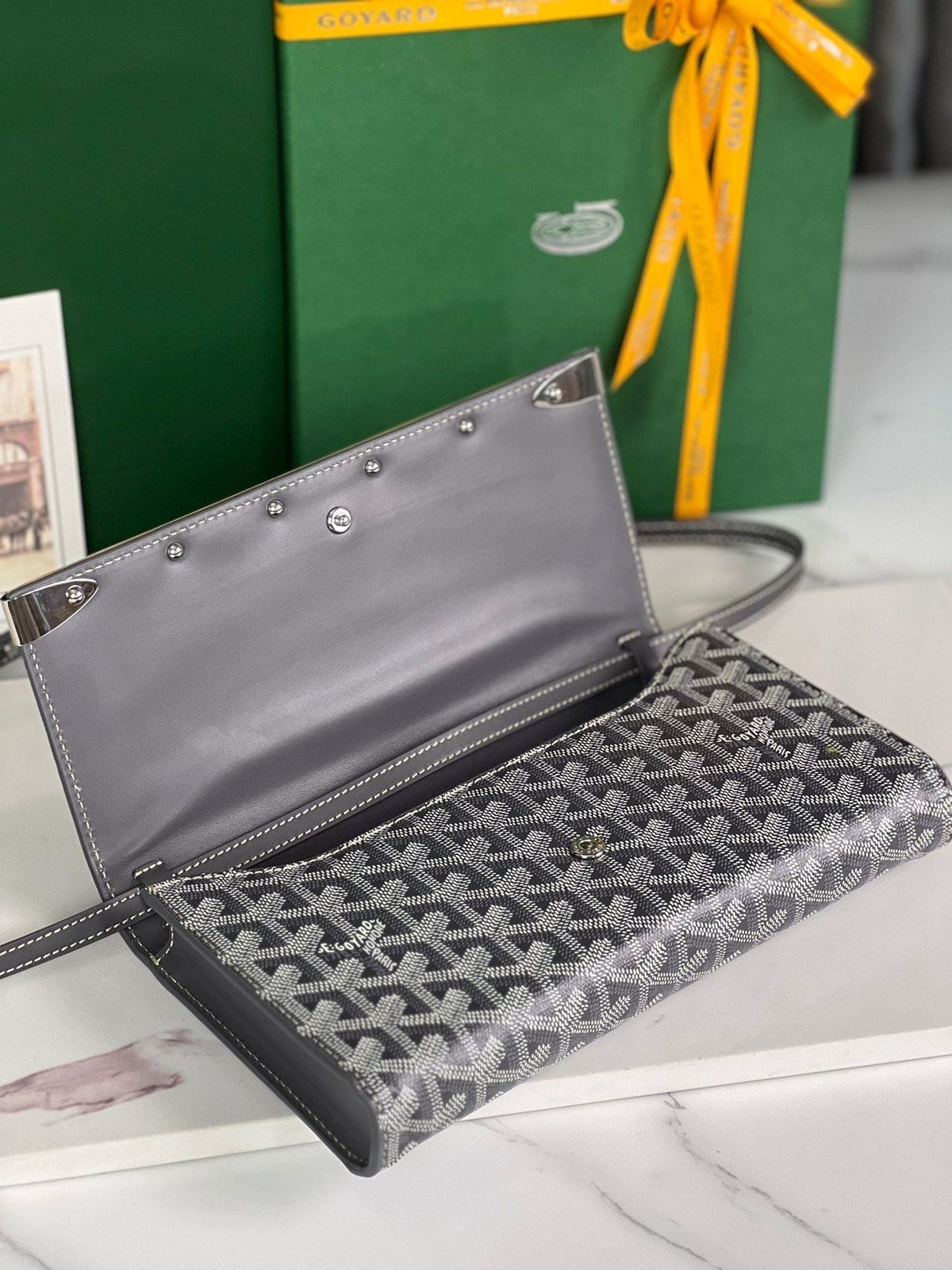MONTE-CARLO PM CLUTCH 25 IN GRAY GOYARDINE CANVAS