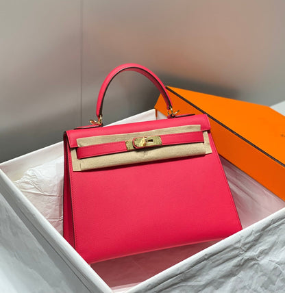 HN 28CM IN ROSE TYRIEN SWIFT CALFSKIN GOLD HARDWARE