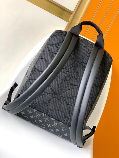 DISCOVERY BACKPACK 41 IN BLACK MONOGRAM MACASSAR CANVAS AND CALFSKIN