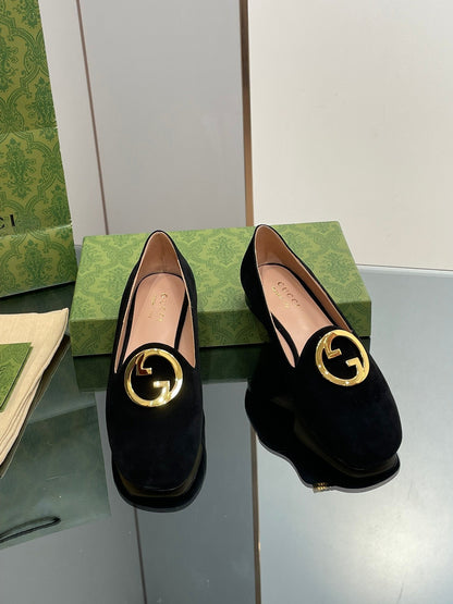 BLONDIE LOGO-PLAQUE LOAFERS IN BLACK SUEDE WITH GOLD HARDWARE