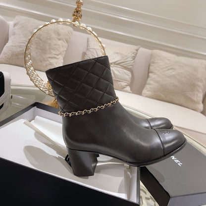 MID-HEEL ANKLE BOOTS IN BLACK CALFSKIN