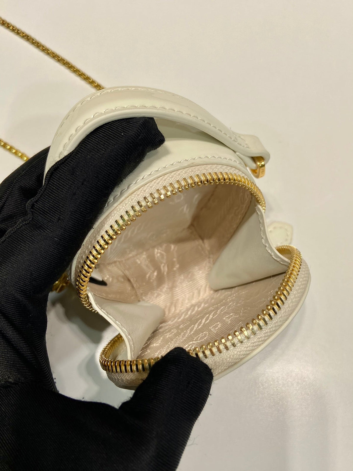 MINI ROUND BAG 8 IN WHITE GLOSSY CALFSKIN GOLD HARDWARE