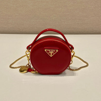 MINI ROUND BAG 8 IN RED GLOSSY CALFSKIN GOLD HARDWARE