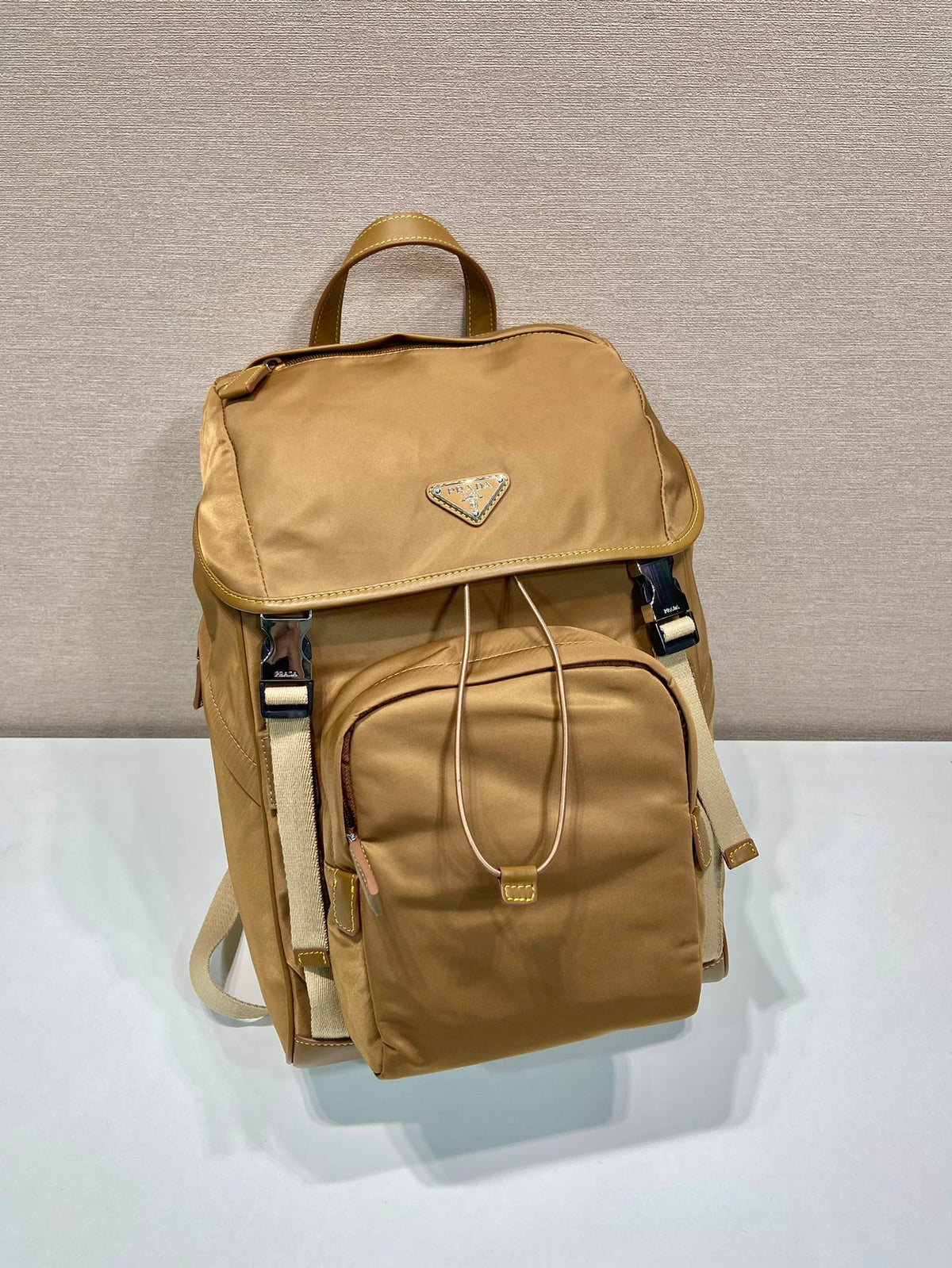 BACKPACK 45 IN CIDER BROWN RE-NYLON AND CALFSKIN TRIM