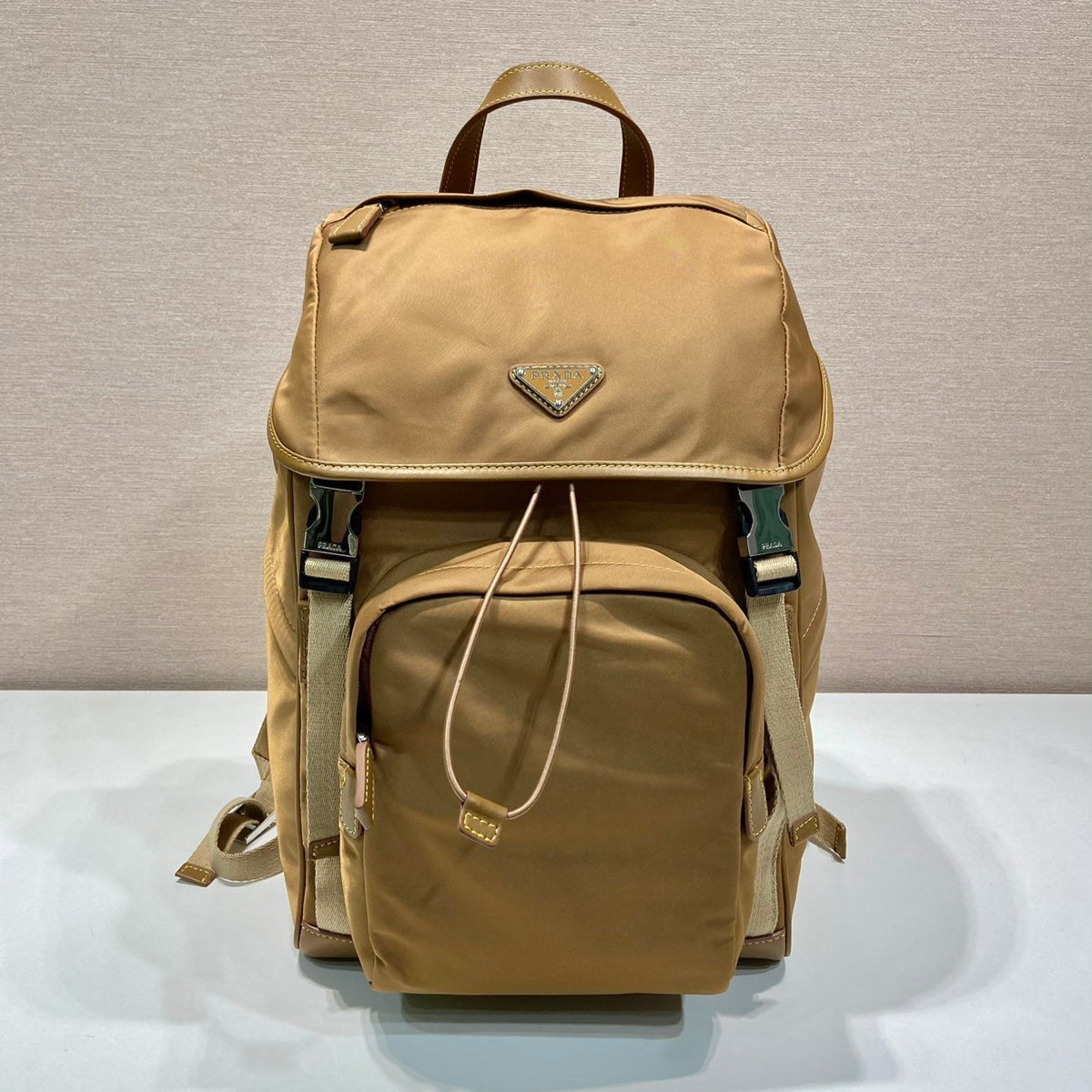 BACKPACK 45 IN CIDER BROWN RE-NYLON AND CALFSKIN TRIM