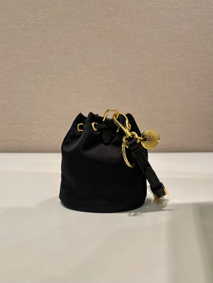 MINI BUCKET BAG 10 IN BLACK RE-NYLON AND SAFFIANO LEATHER STRAP