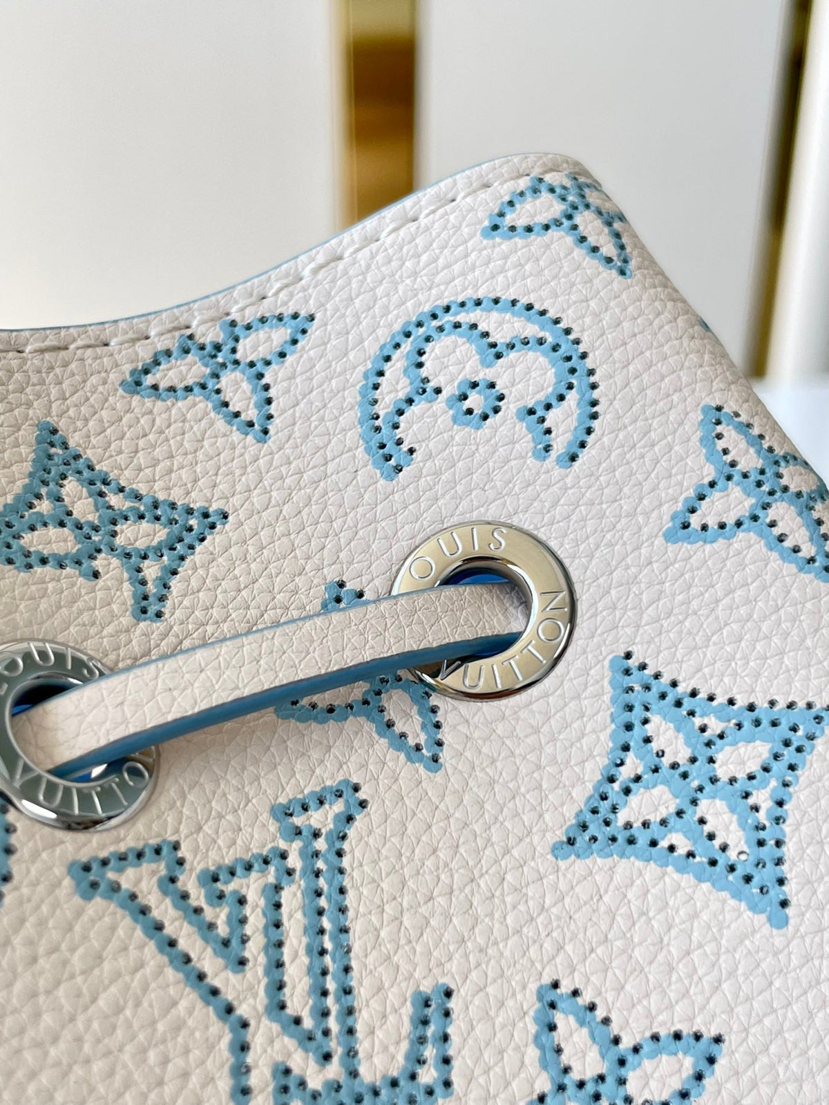 BELLA 22 IN WHITE PERFORATED CALFSKIN SILVER HARDWARE