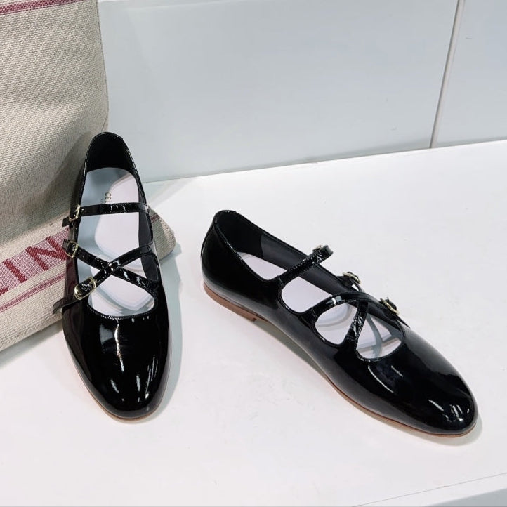 LES BALLERINES CELINE BABIES IN BLACK PATENT CALFSKIN