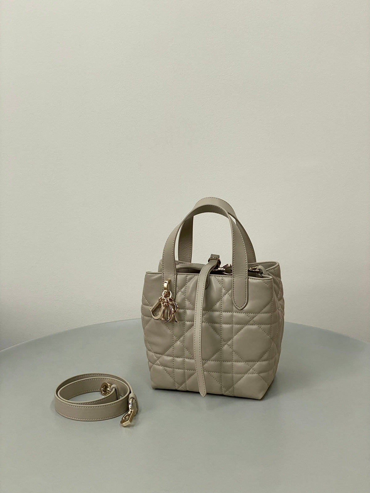 MINI TOUJOURS BUCKET BAG 18 IN BEIGE CANNAGE CALFSKIN