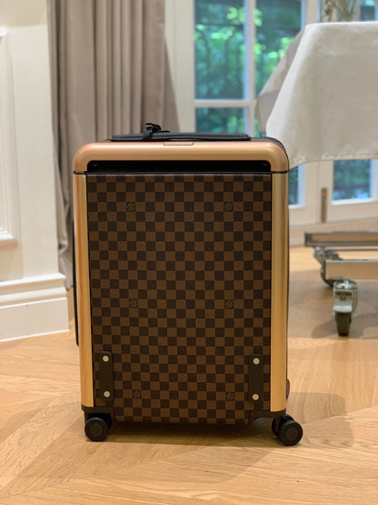 Louis Vuitton Horizon 55 rolling suitcase in Damier Ebene canvas.