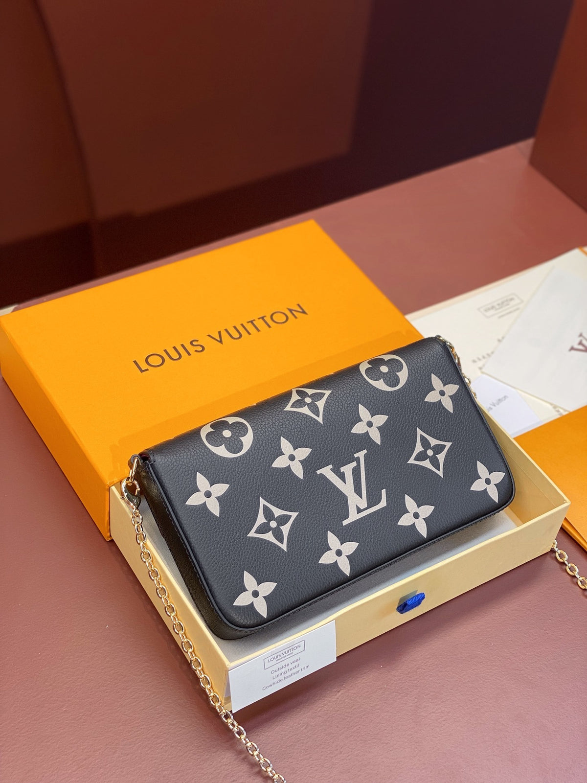 Louis Vuitton Félicie Pochette in black and beige Bicolor