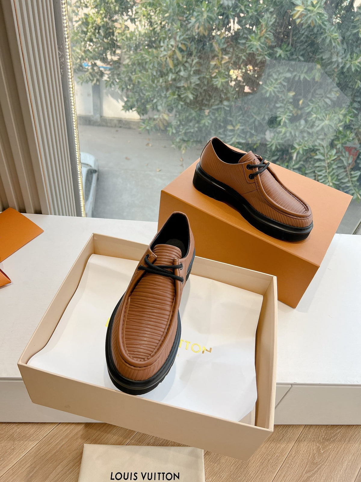 LV Women Brown Textured Leather Loafers