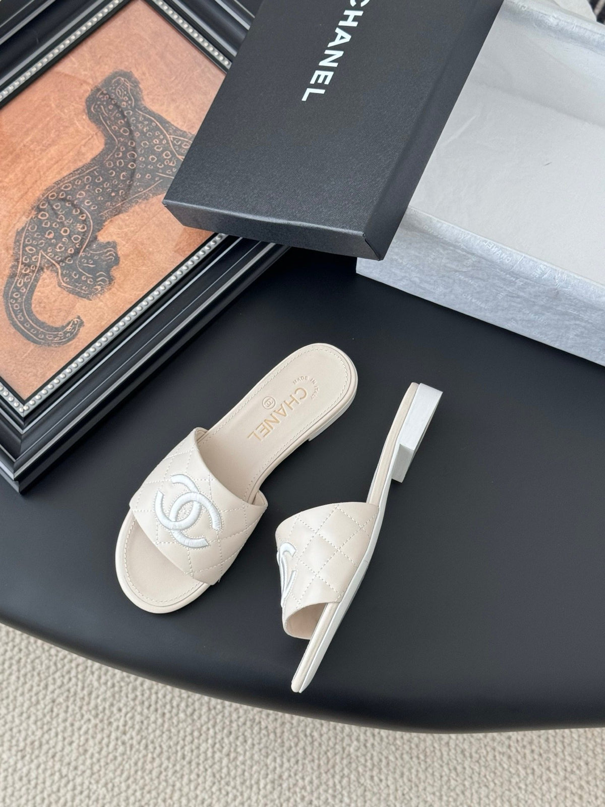 Chanel Women Cream Quilted Leather Slides