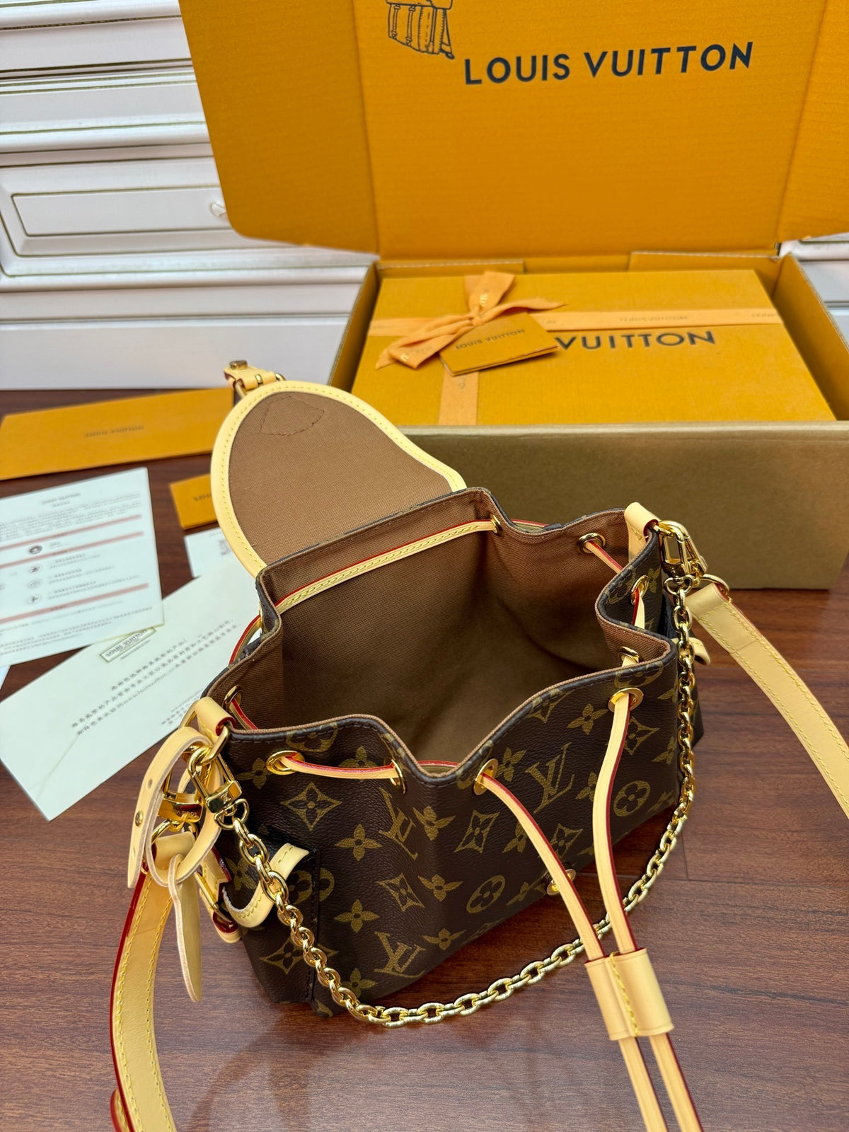 Louis Vuitton Odyssée Handbag in Signature Monogram canvas
