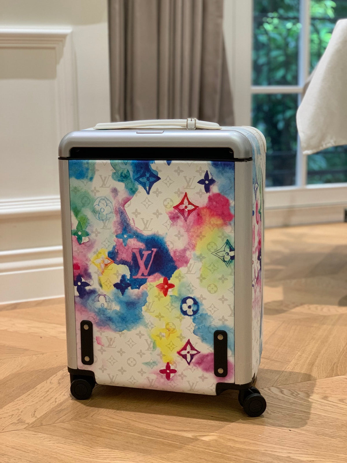 Louis Vuitton Horizon 55 suitcase in the Watercolor Multicolor