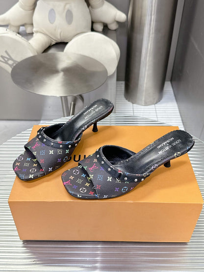 LV Women Black Patterned Leather Mules