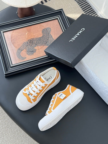 Chanel Women Yellow Canvas And Rubber Sneakers