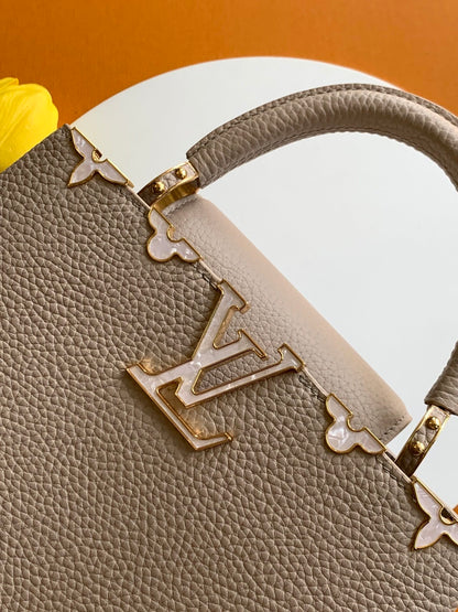 Louis Vuitton Capucines handbag in a beige