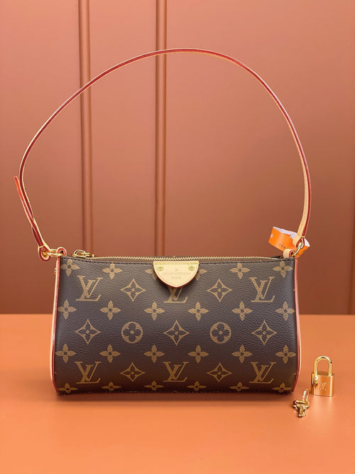 Louis Vuitton Pochette Tirette bag in monogram coated canvas
