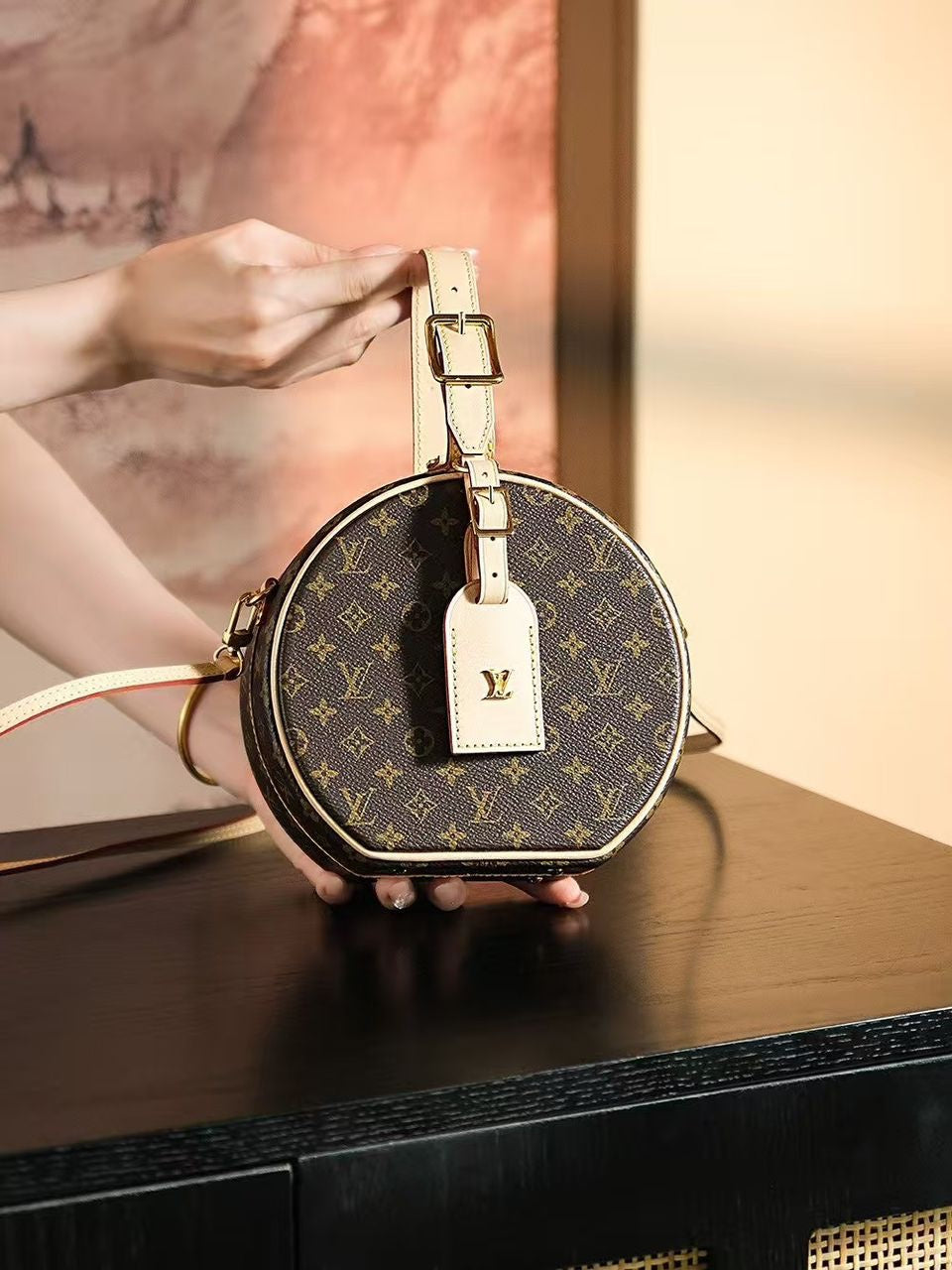 Louis Vuitton Petite Boite Chapeau handbag in Monogram canvas
