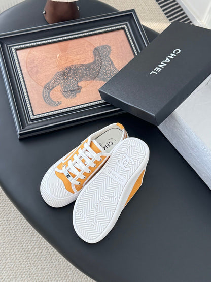 Chanel Women Yellow Canvas And Rubber Sneakers