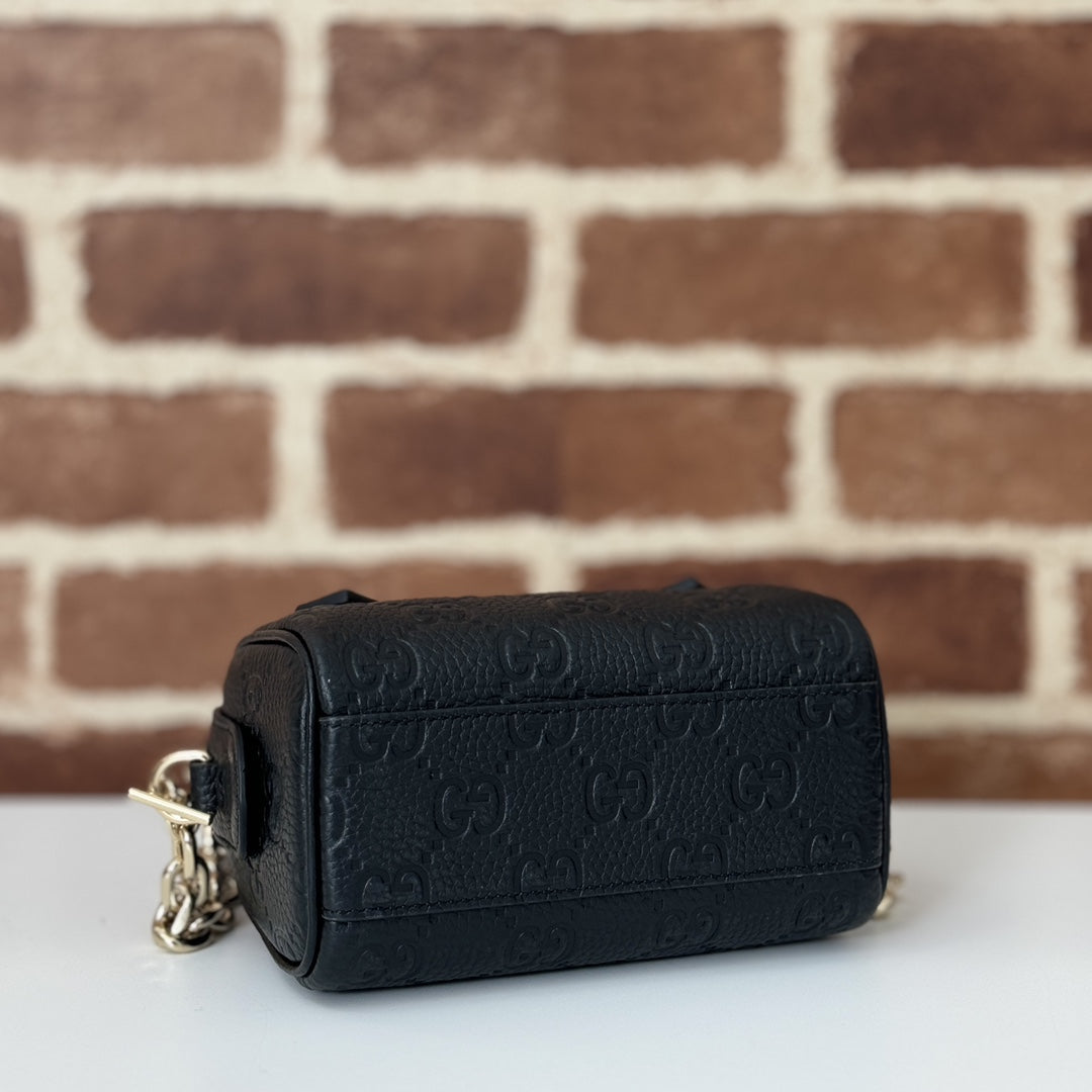 GUCCI GG Emblem medium boston bag in Black Leather