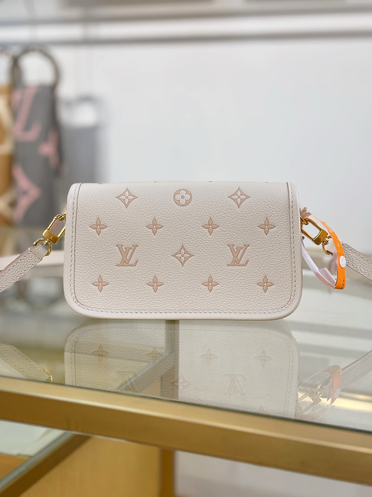 Louis Vuitton Nano Diane bag in cream Monogram Empreinte