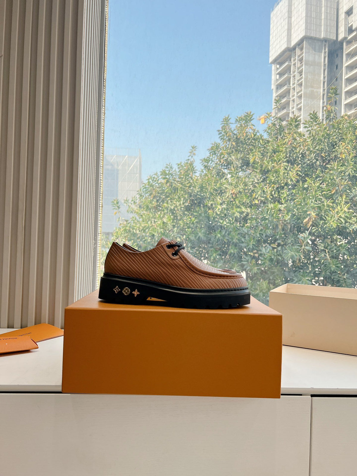 LV Women Brown Textured Leather Loafers