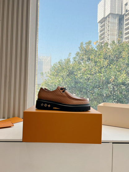 LV Women Brown Textured Leather Loafers