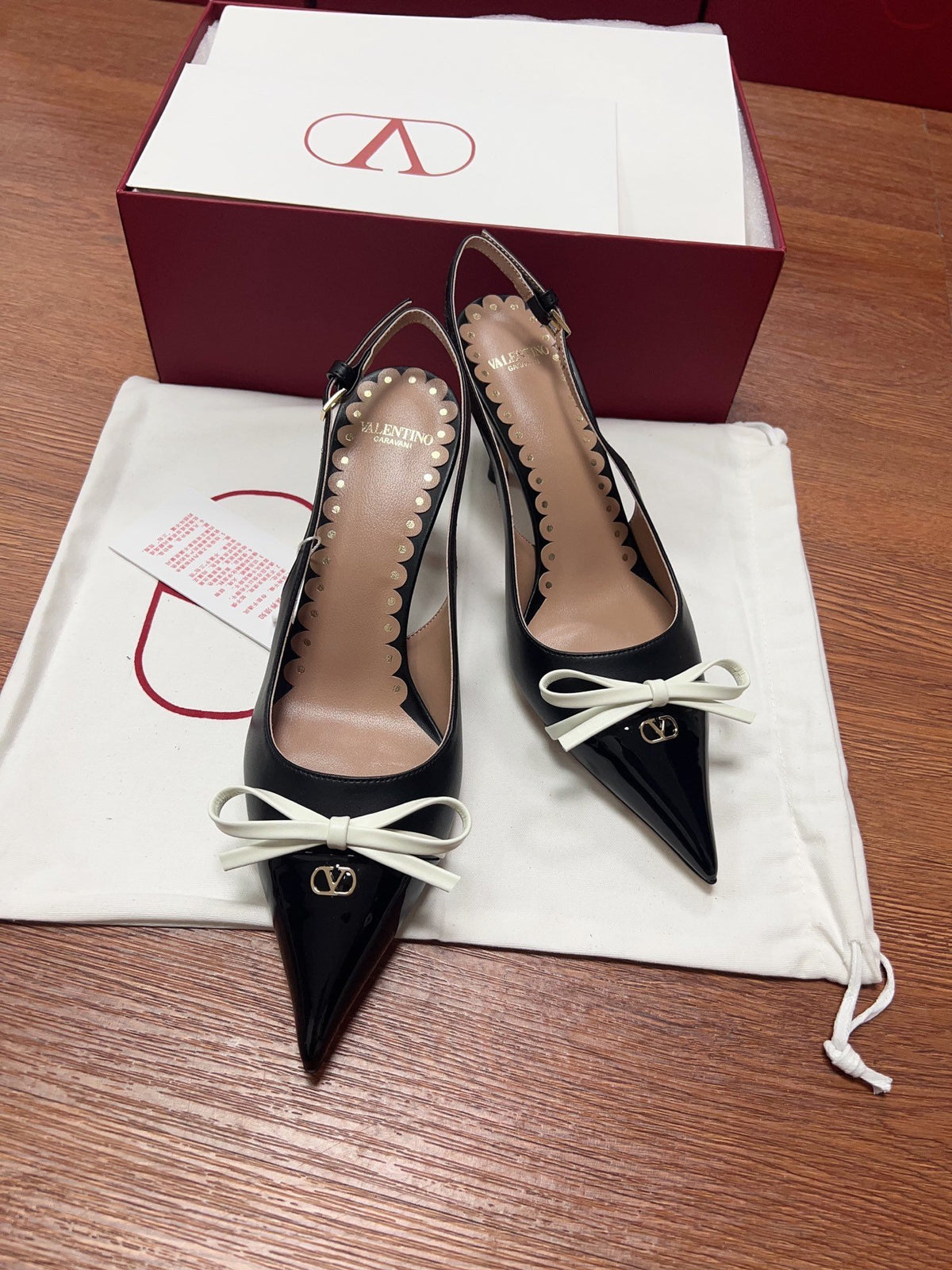 Valentino Women Black Patent Leather Bow Slingback Pumps