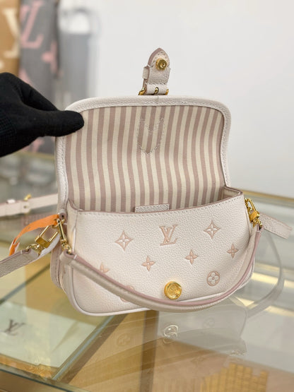 Louis Vuitton Nano Diane bag in cream Monogram Empreinte