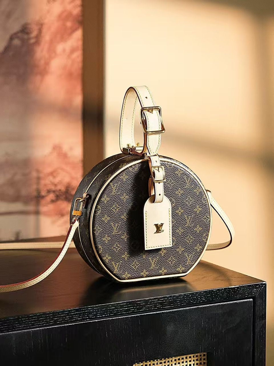Louis Vuitton Petite Boite Chapeau handbag in Monogram canvas