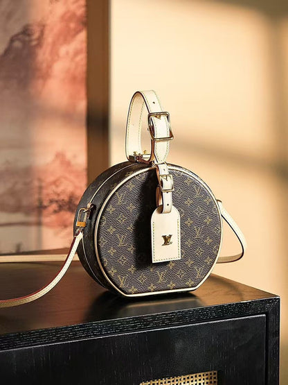 Louis Vuitton Petite Boite Chapeau handbag in Monogram canvas