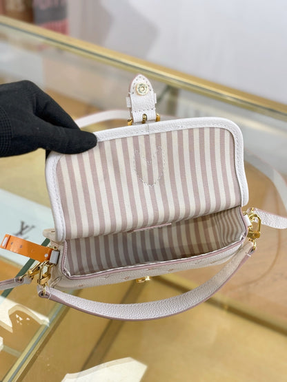 Louis Vuitton Nano Diane bag in cream Monogram Empreinte