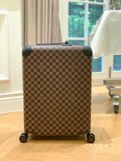 Louis Vuitton Horizon 55 rolling suitcase in Damier Ebene canvas.