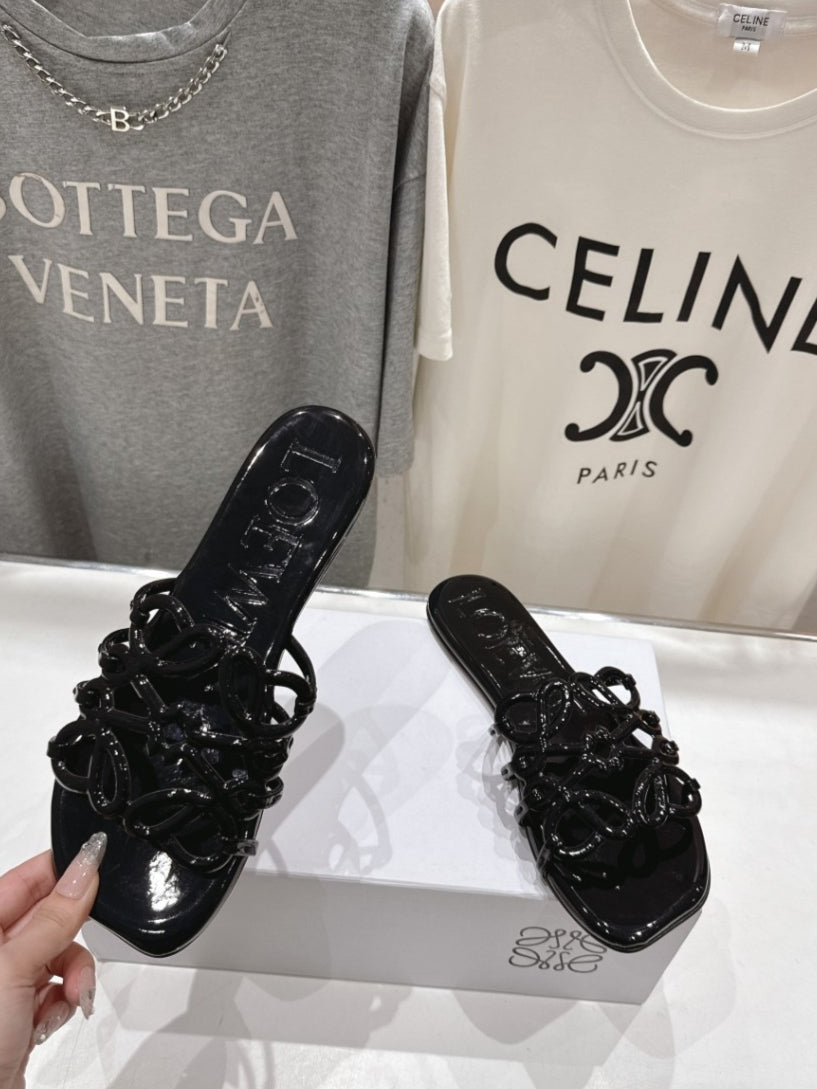 Loewe Leather Petal Anagram Slides in Black