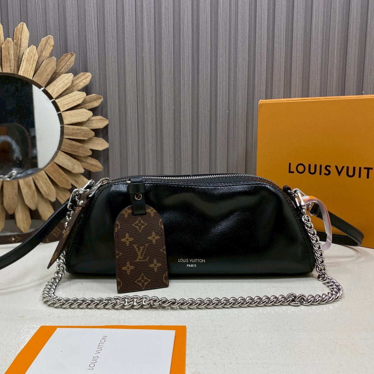 Louis Vuitton Pochette Vibe in black