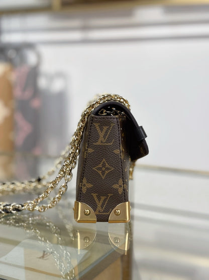 Louis Vuitton Trunkie handbag