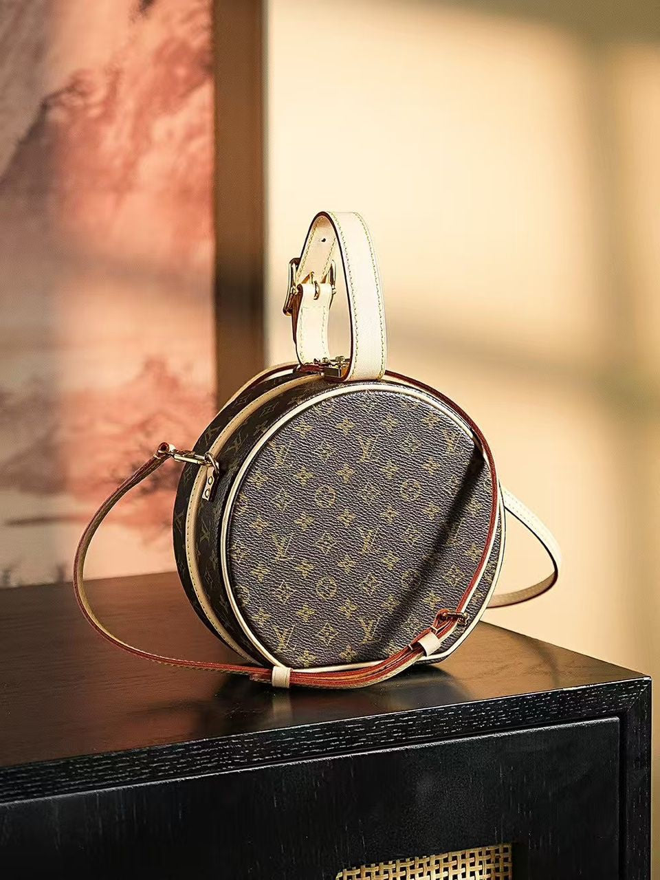 Louis Vuitton Petite Boite Chapeau handbag in Monogram canvas