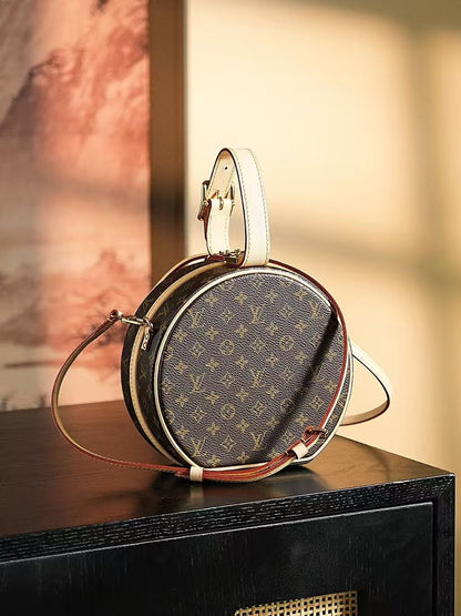 Louis Vuitton Petite Boite Chapeau handbag in Monogram canvas
