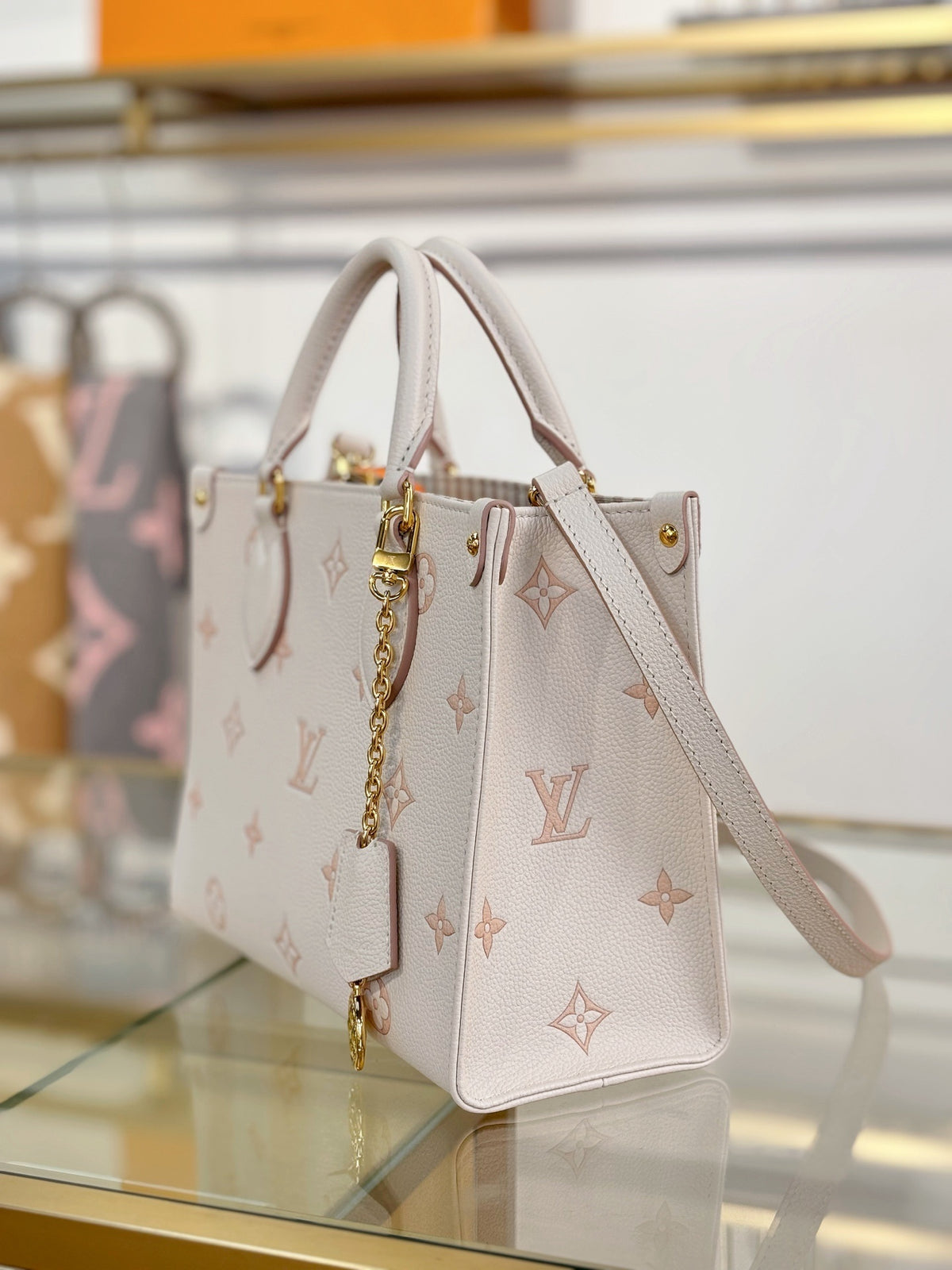 Louis Vuitton OnTheGo Mini bag (M14403) in white Monogram Empreinte