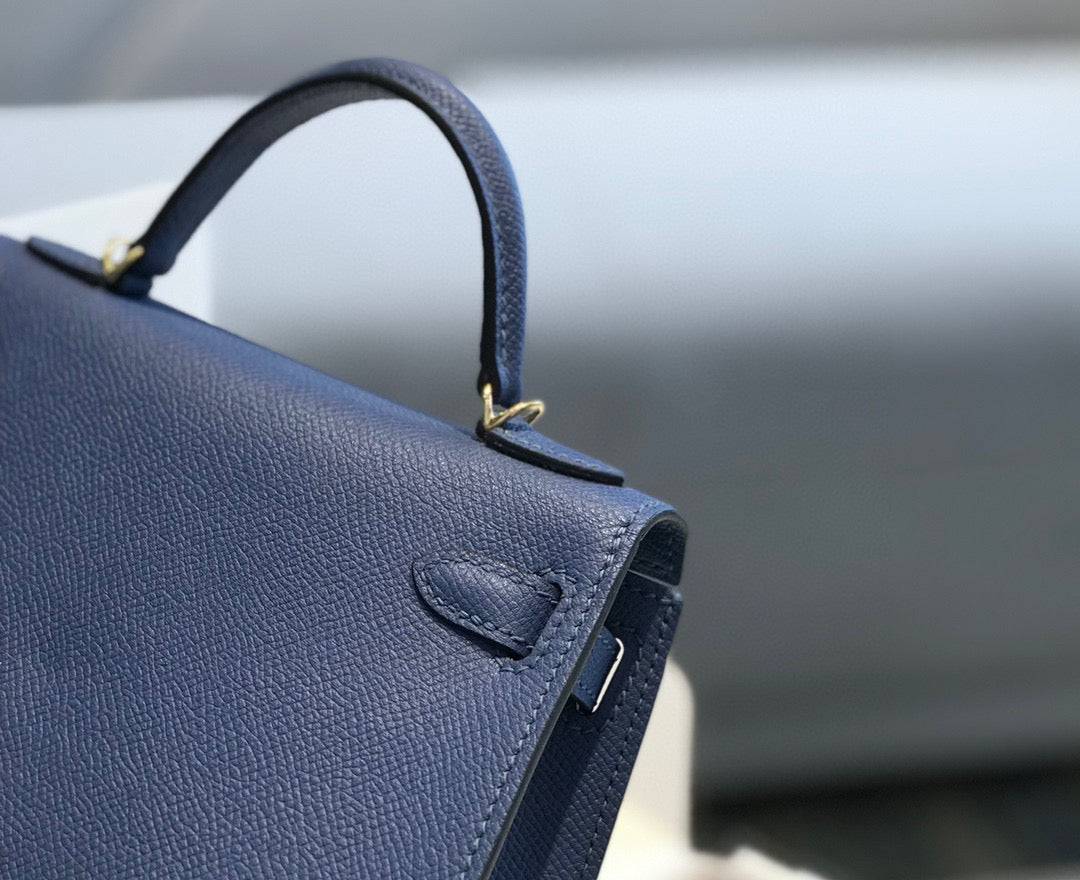 HN Mini Kelly Blue with gold-tone hardware