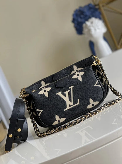 Louis Vuitton Bicolor Monogram Empreinte Multi Pochette