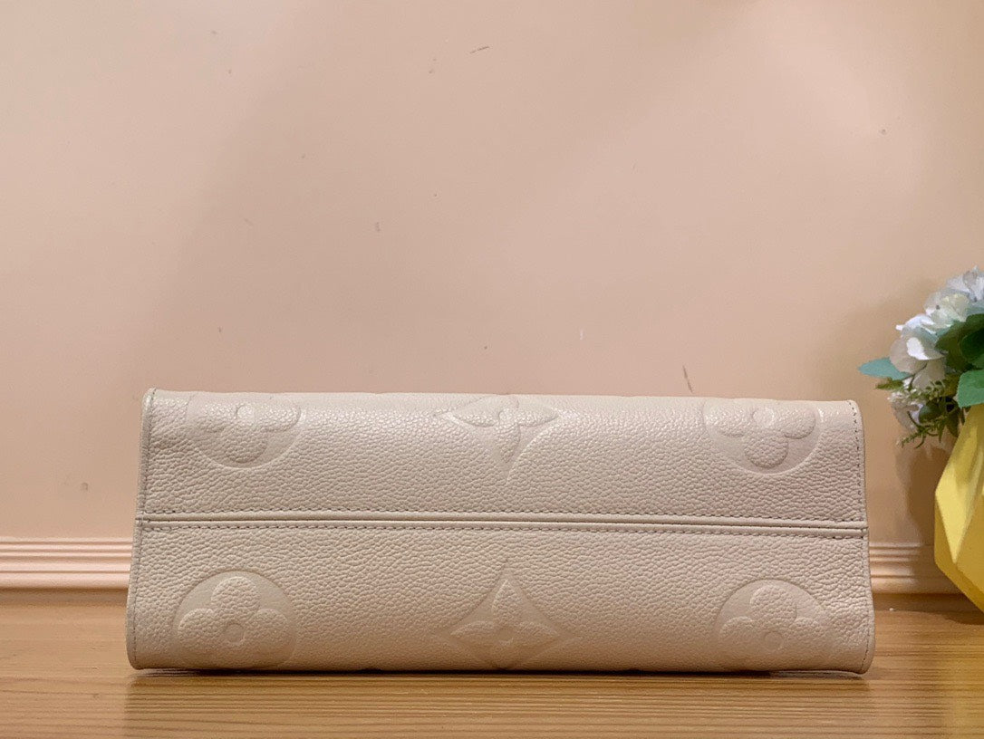 Louis Vuitton LV On The Go Mini Replica 11 White Milk Handbags 25x13x10cm
