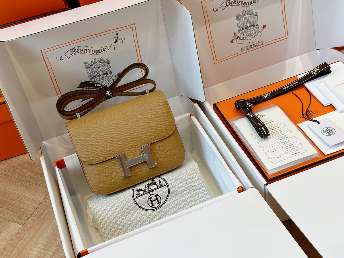 HN 19  Brown Epson Leather Palladium Hardware