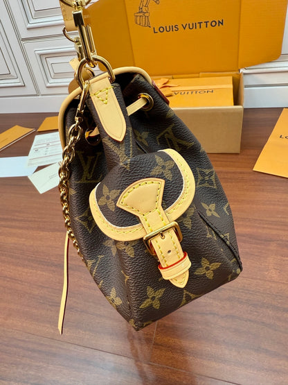Louis Vuitton Odyssée Handbag in Signature Monogram canvas