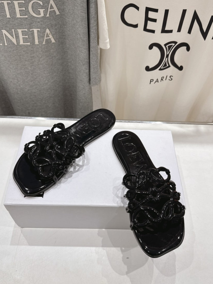 Loewe Leather Petal Anagram Slides in Black