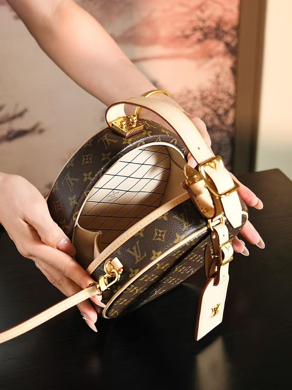 Louis Vuitton Petite Boite Chapeau handbag in Monogram canvas