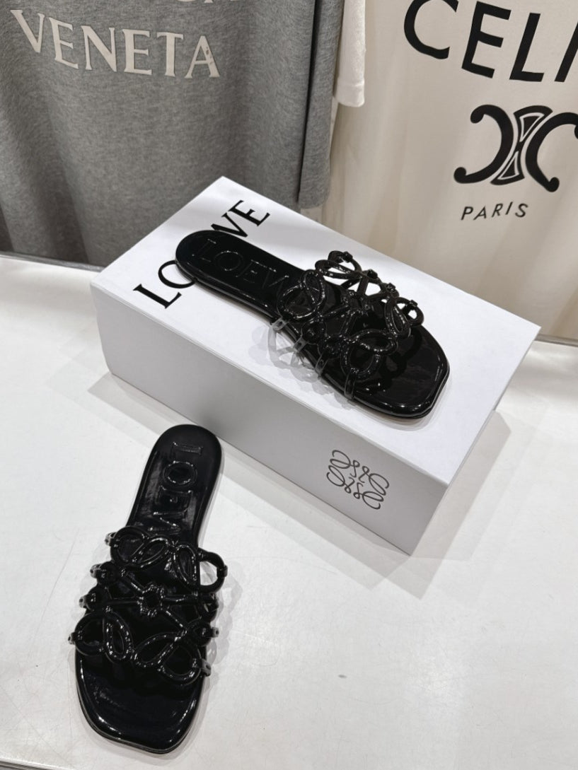 Loewe Leather Petal Anagram Slides in Black